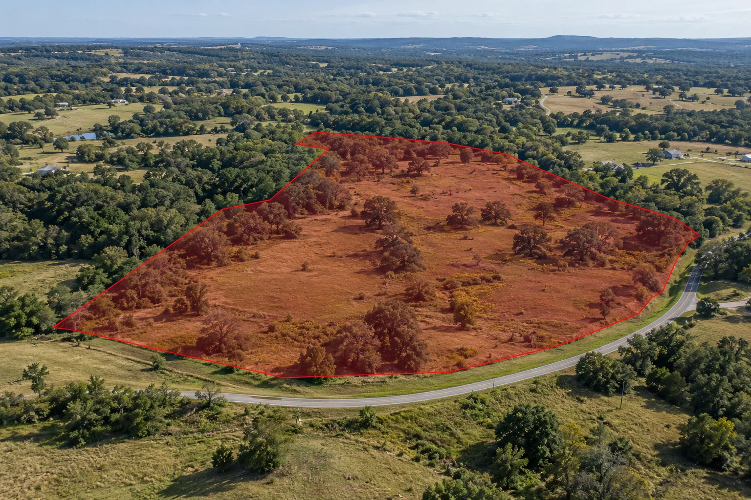 AI-generated land illustration with a red example boundary, not a photograph of this transaction’s parcel
