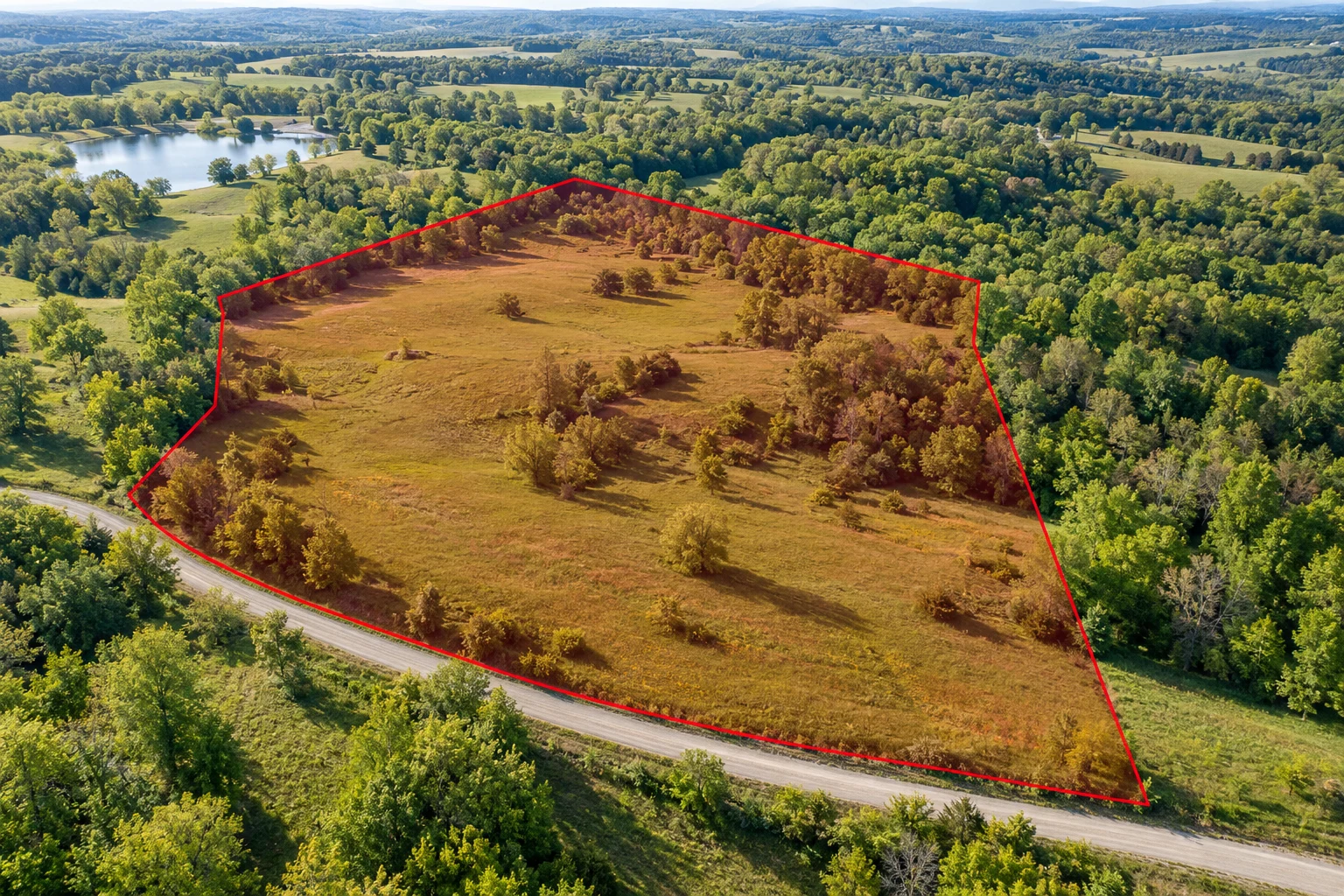 AI-generated land illustration with a red example boundary, not a photograph of this transaction’s parcel